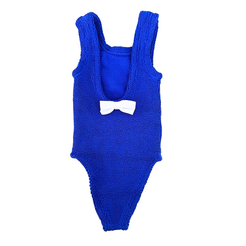 Product shot of the back of the Baby Alva Swimsuit in Royal Blue from Hunza G