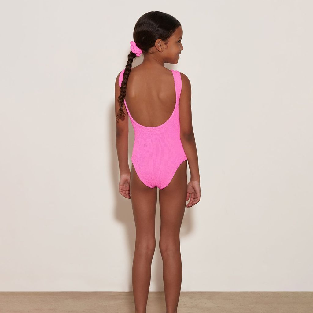 Image of the back of the Hunza G Baby Classic Swimsuit in Bubblegum for girls aged 3 - 6 years