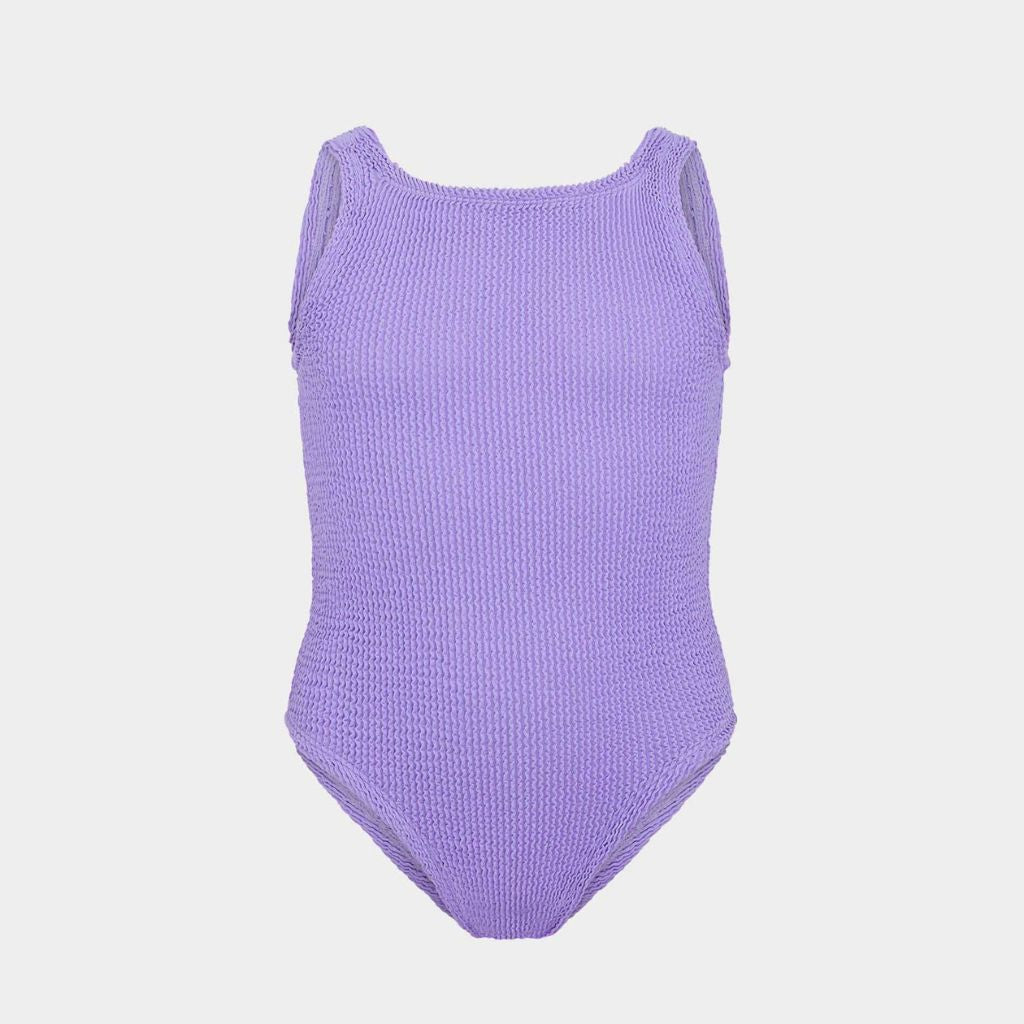 Image of the front of the Hunza G Baby Classic Swimsuit in Lilac for girls aged 3 - 6 years