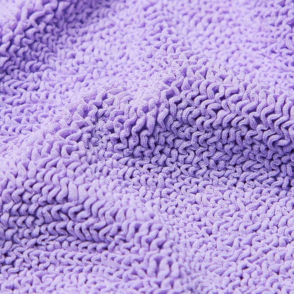 Close up of the fabric on the Hunza G Kids Classic Swimsuit in Lilac for girls aged 7 - 12 years