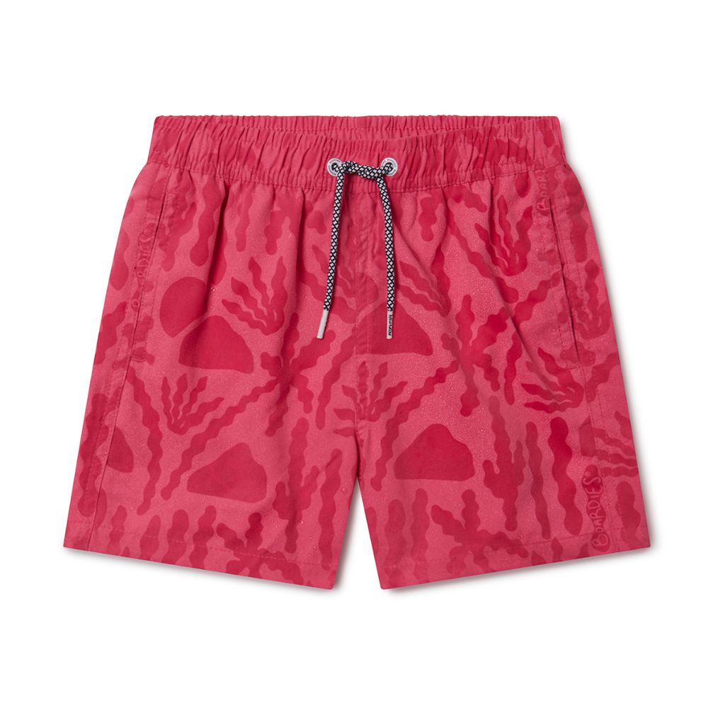 Front product shot of the Boardies Las Coloradas Kids Swim Shorts when wet using water reactive fabric