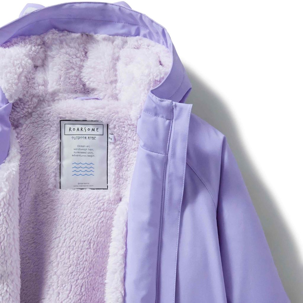 Close up of the Sparkle the Unicorn Outdoor Changing Robe Dry Robe in purple from Roarsome