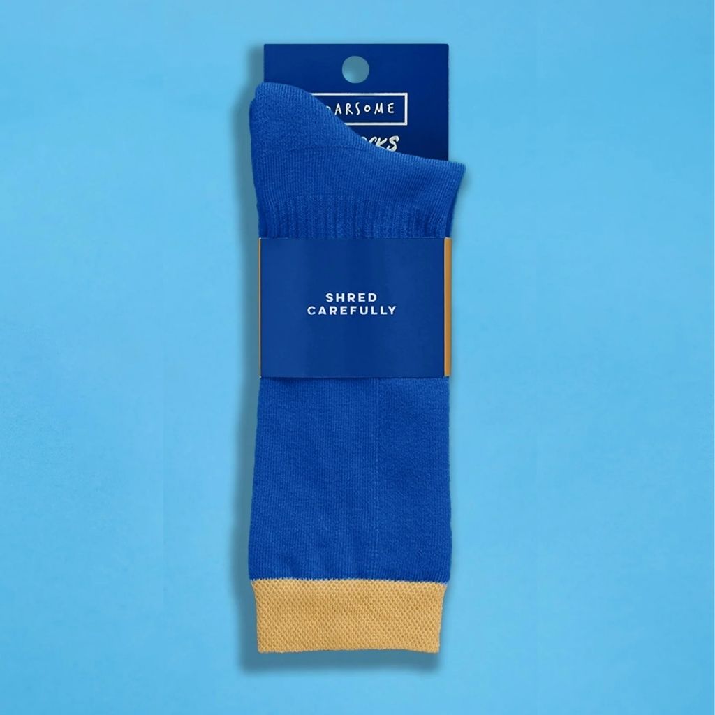 Packaging of a Pair of blue ski socks from global outdoor kids brand Roarsome