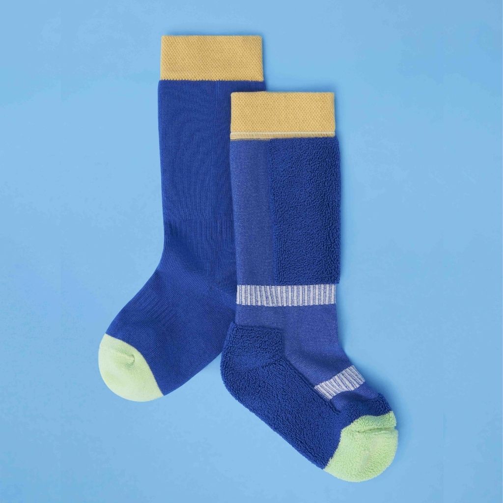 Pair of blue ski socks from global outdoor kids brand Roarsome
