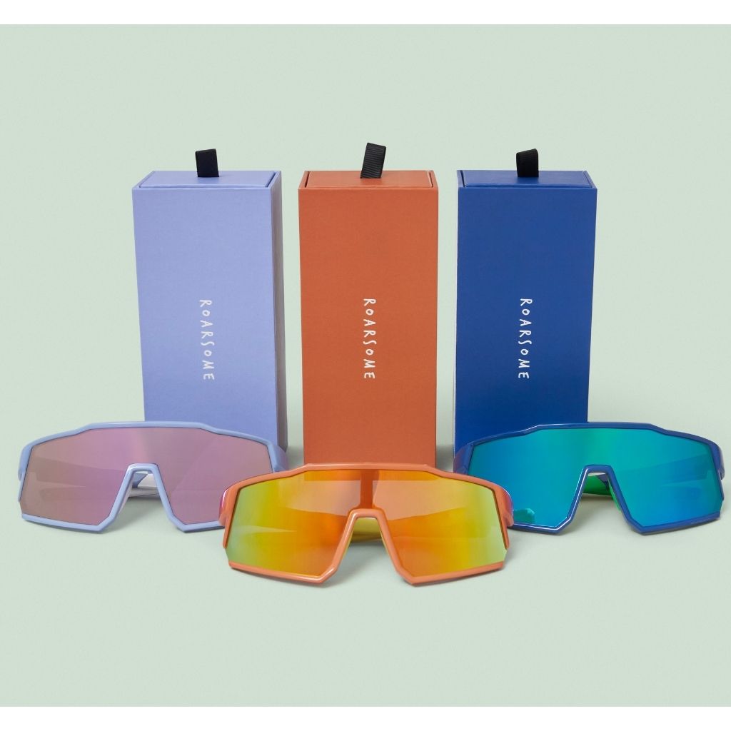 Trio of Roarsome kids sunglasses in purple, yellow and blue