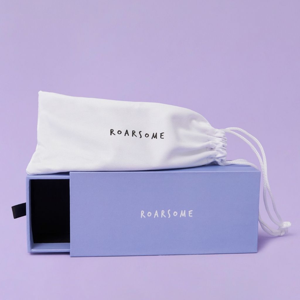 Packaging for Pink wraparound sunglasses from Roarsome