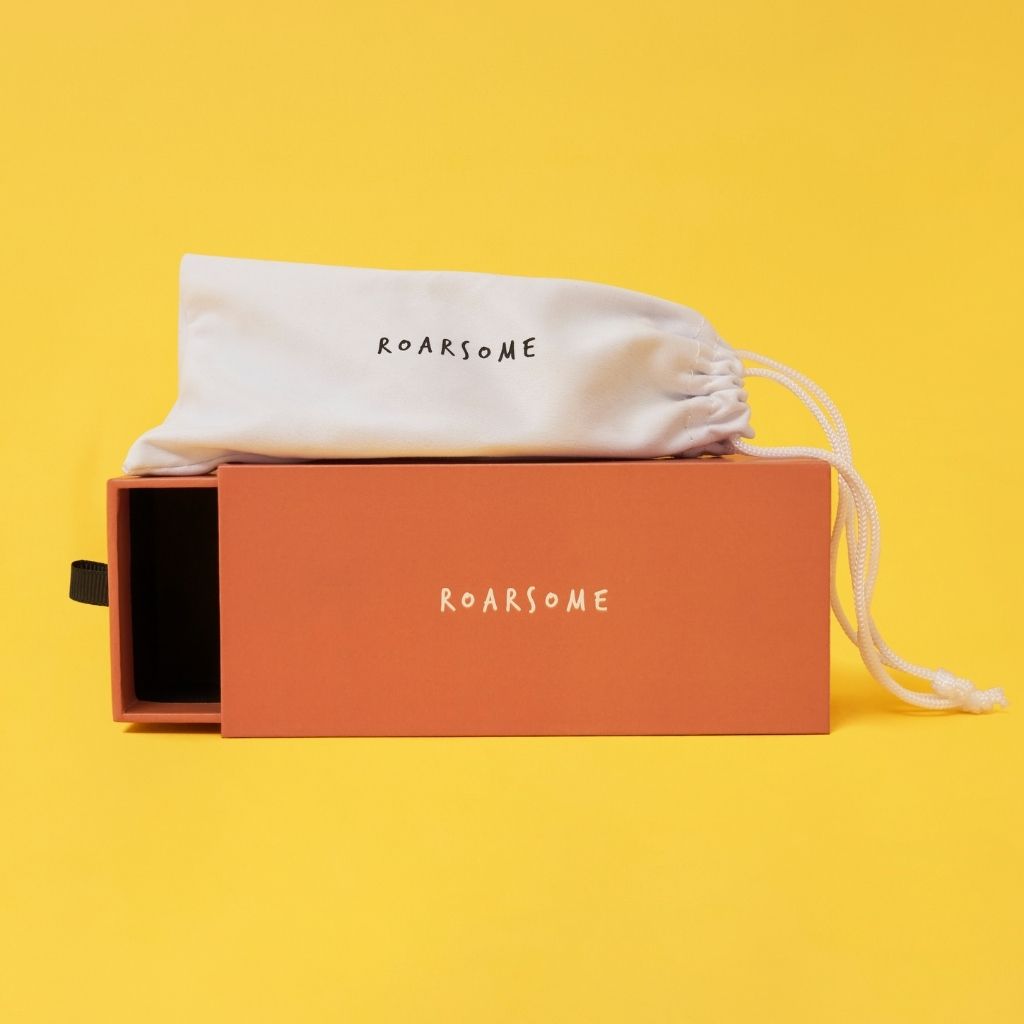 Packaging for yellow wraparound sunglasses from Roarsome