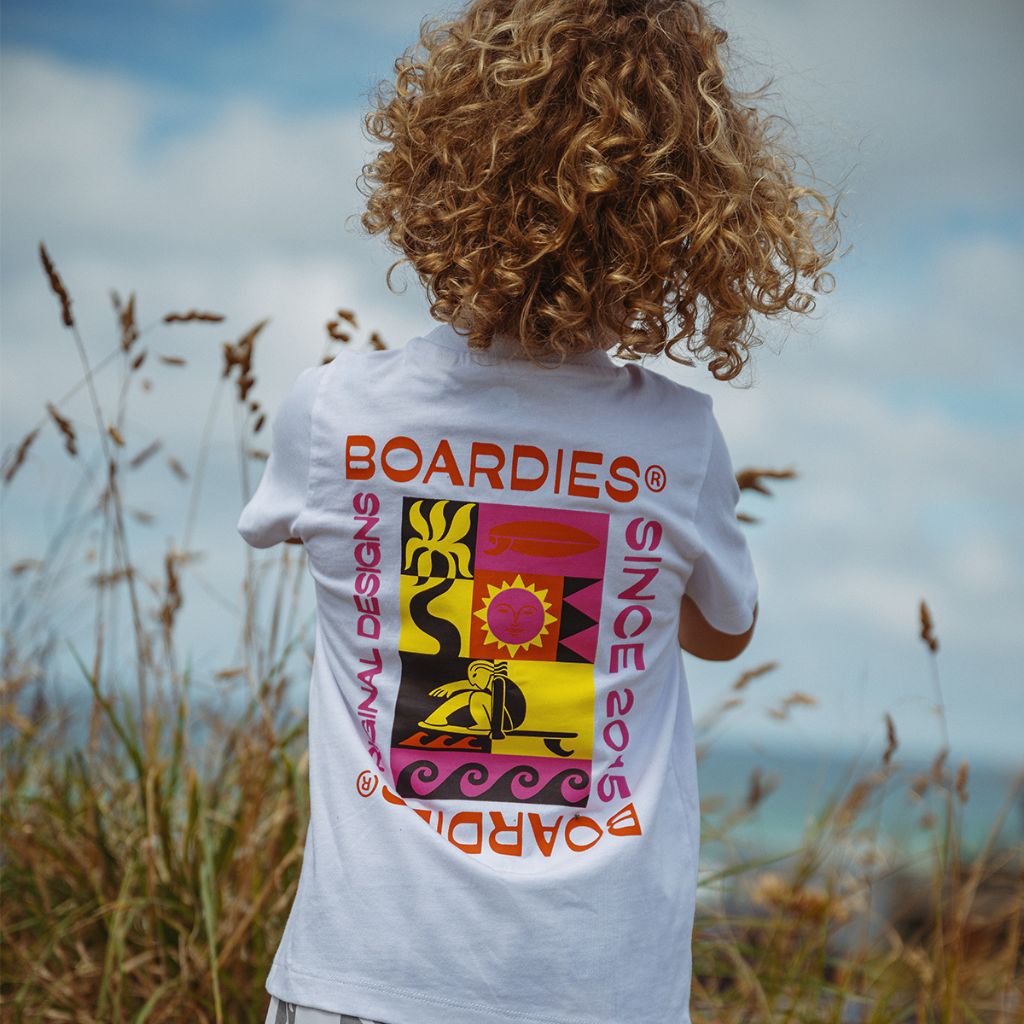 Little boy from the back wearing the Boardies Watergate Kids T-Shirt 