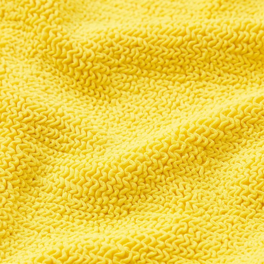 Close up of the Sunflower yellow crinkle fabric on the Hunza G Duo Lyra Bikini